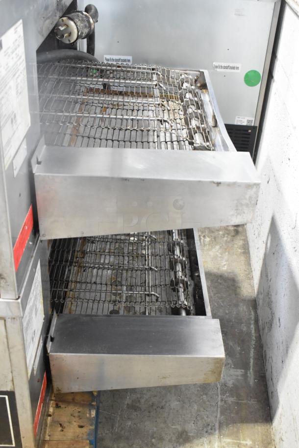 2021 Middleby Marshall CTX DZ33I stainless steel electric pizza ovens on casters, 208V, with dual conveyors.