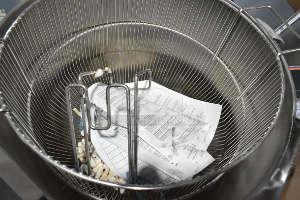 Brand new Groen TDH-48C stainless steel 12-gallon steam tilting kettle with visible documents; natural gas, 52,000 BTU.