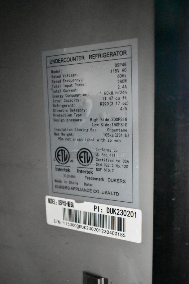 Dukers DSP48 label showing specs: 115V, 60Hz, ETL certified, refrigerant R290, 11.47 cu ft, model DSP48.