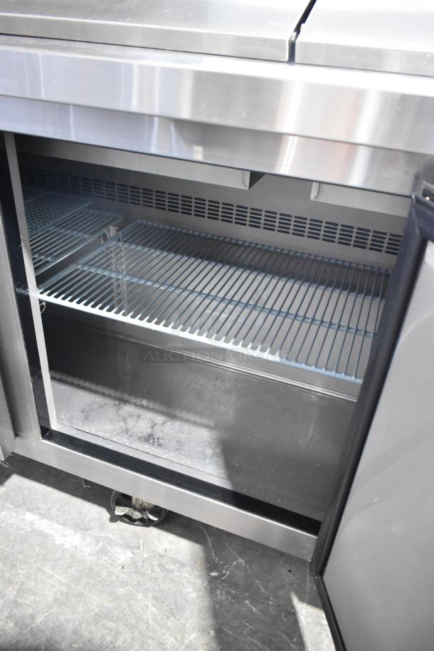 Dukers commercial sandwich salad prep table with Bain Marie mega top, two-tier shelf, on casters, 115V, 1 phase.