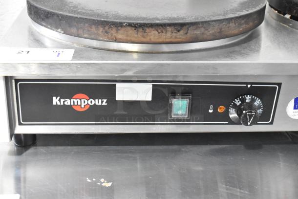Krampouz commercial 2-burner crepe maker, countertop model, features temperature dial, visible wear on cooking surface.