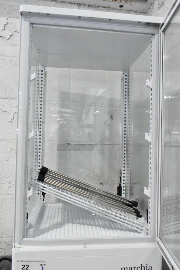 Marchia MDC78W Countertop Refrigerated Merchandiser in clean condition, 110-120 volts, 1 phase, features glass door and adjustable shelves.