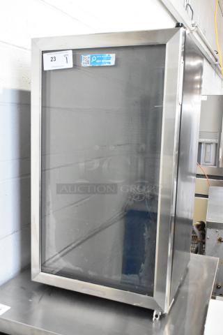 Homelabs HME030065N Mini Cooler Merchandiser, 115V, 1 Phase. Glass door, metal frame, auction tag visible, good condition.