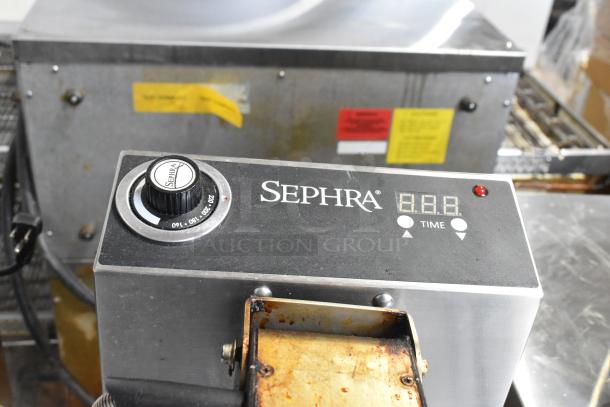 Sephra SEMANWB Countertop Waffle Maker, 120V, used condition, visible controls and brand label, compact design.
