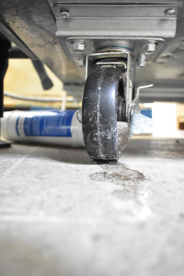 2024 Coldline UC-27F undercounter freezer with commercial casters, shown in excellent condition. 115V, 1 Phase.