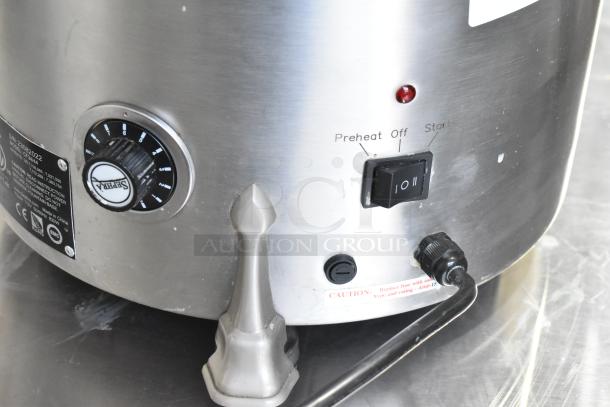 Sephra CF34/44 chocolate fountain controls, showing power dial, switch labels, and model plate. Stainless steel finish.
