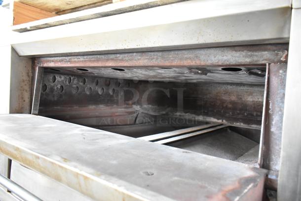 Bari M54S commercial pizza oven, natural gas powered, single deck, with cooking stones, on metal legs, 80,000 BTU.