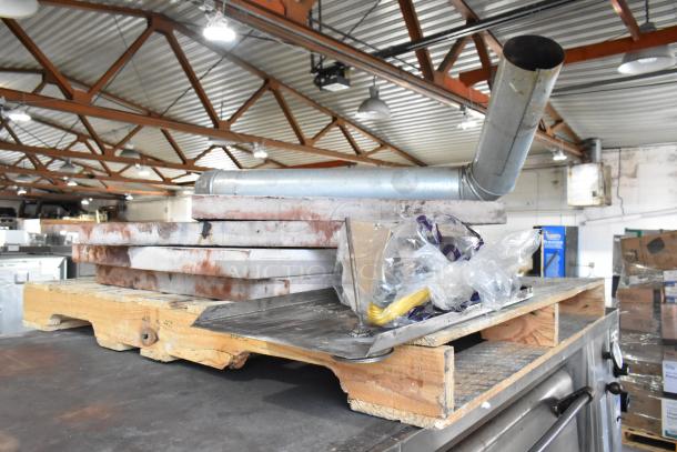 Bari M54S commercial pizza oven, single deck, natural gas, with cooking stones and metal legs. 80,000 BTU. Includes vent pipe.