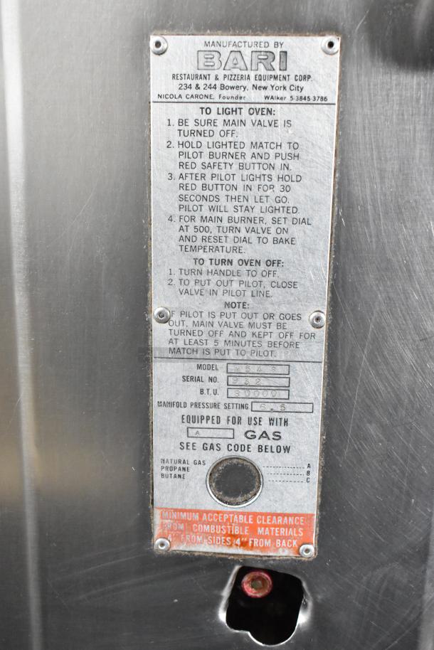 Bari M54S commercial pizza oven label detailing model, BTU, gas code, and usage instructions.