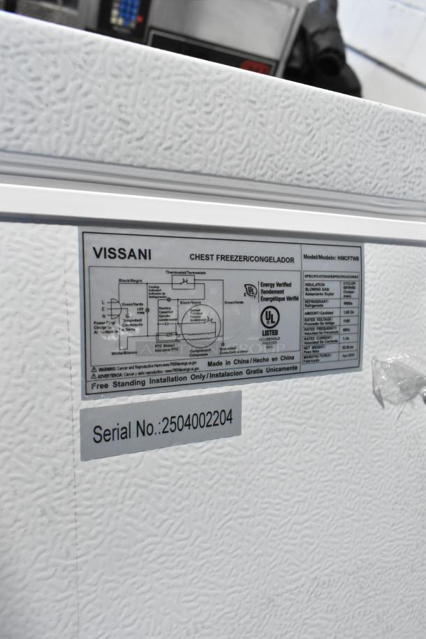 Vissani HMCF7W5 chest freezer with manual defrost, 7.0 cu. ft., 115V, 1 phase, visible specs label, serial no. 2504002204.