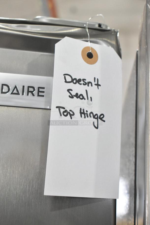 Frigidaire FFFU13F2VV upright freezer, 13.0 cu. ft. capacity. Note: tag indicates "Doesn't seal, top hinge."