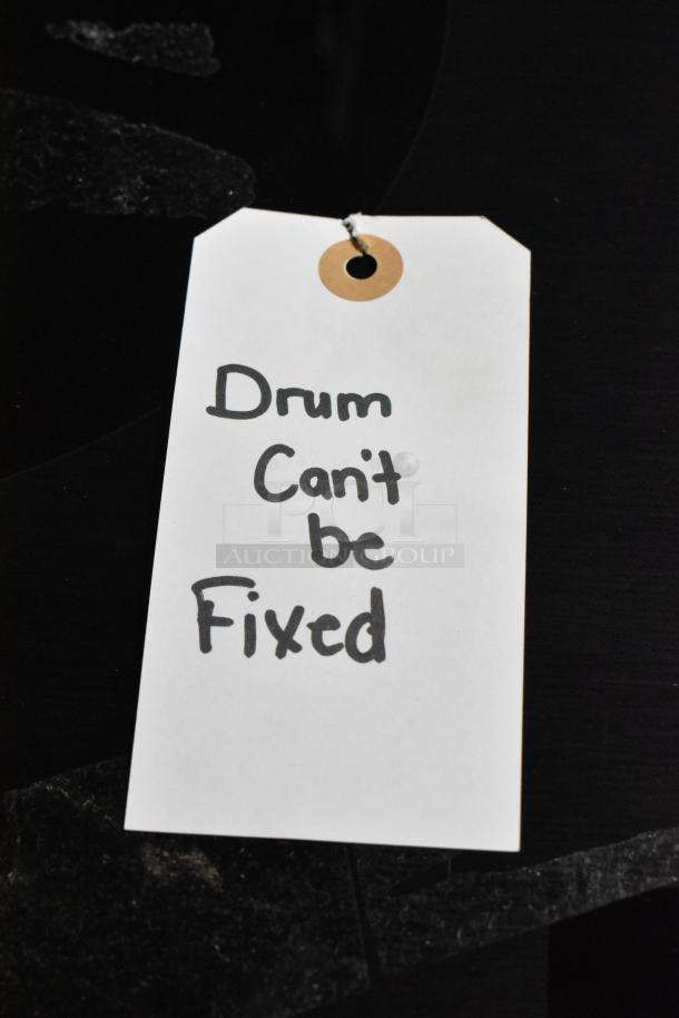 Samsung DVE45B6300P electric dryer, 27 inch, 7.5 cu.ft. capacity. Tag indicates "Drum can't be fixed."