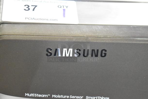 2025 Samsung DVE45B6300P 27 Inch Smart Electric Dryer, 7.5 Cu.Ft. Capacity, MultiSteam, and SmartThings tech, good condition.