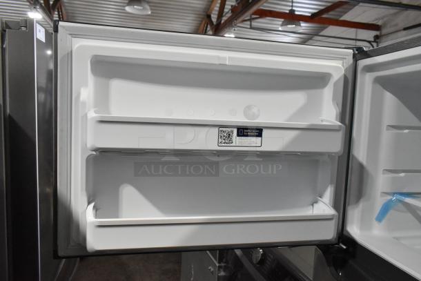 Brand new 2025 Frigidaire FFTR1835VSC Reach In Cooler with Freezer, 115V, 1 Phase; QR code for registration visible.