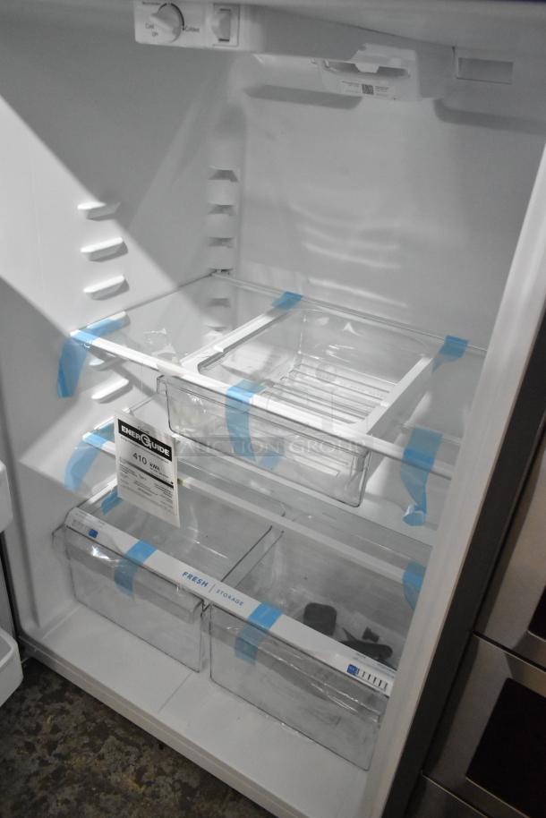 Brand new 2025 Frigidaire FFTR1835VSC reach-in cooler with freezer. Includes fresh storage bins, 115 volts, 1 phase, and energy guide label.