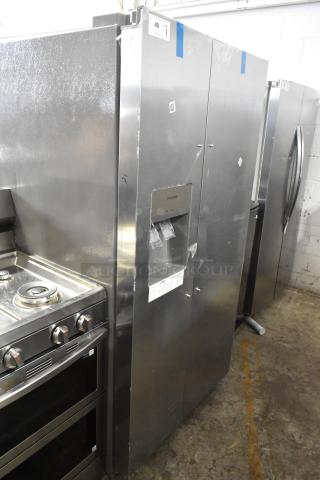 Frigidaire FRSS2623ASM cooler w/ freezer, stainless steel, 115V, 1 phase. New with scratches, tags visible.