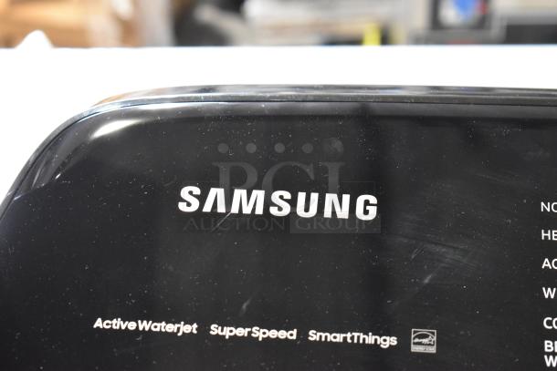 Samsung Top Load Washer featuring Active Waterjet, SuperSpeed, and SmartThings technology. Black finish, excellent condition.