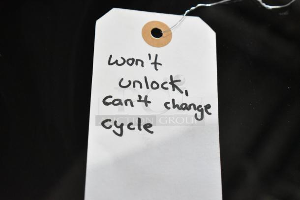 Samsung Top Load Washer with lock issue and cycle change problem, as indicated on attached tag. Needs repair.