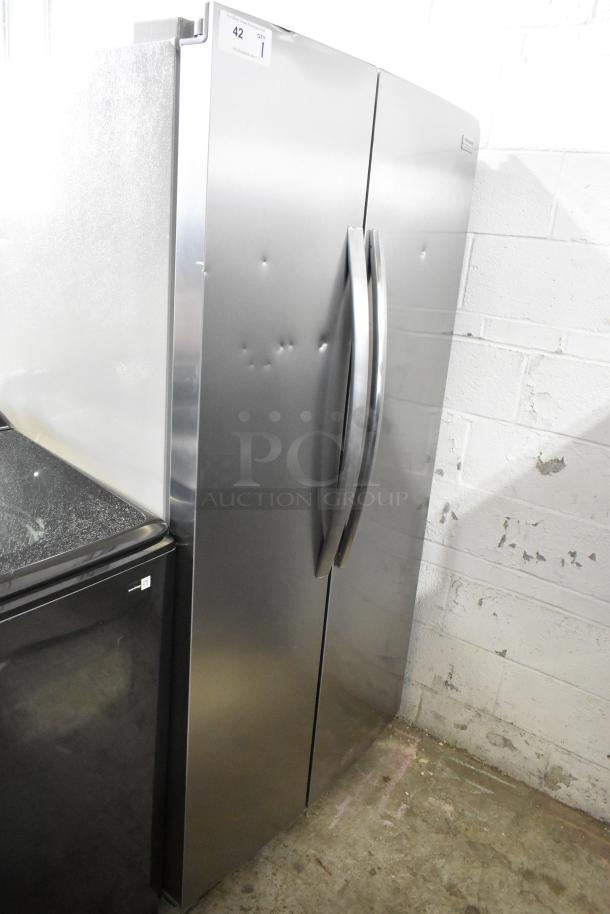 Brand new Frigidaire SEE26NVDDA cooler/freezer, 115V, 1 phase. Scratch and dent, stainless steel, visible bumps.