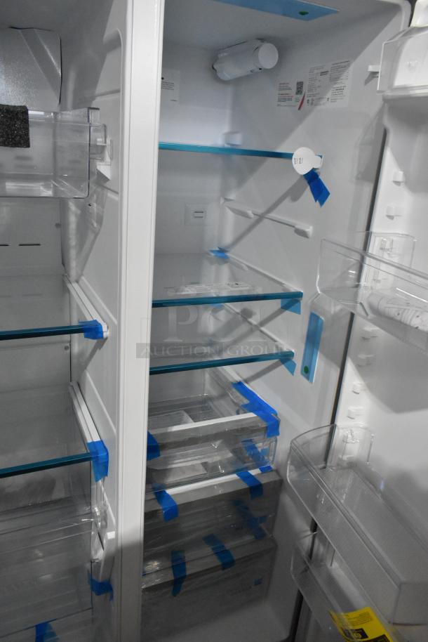 Brand new Frigidaire Gallery SEE26NVDDA reach-in cooler with freezer. Clear shelving, protective film, 115V, 1 phase.