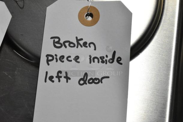 "Broken piece inside left door" handwritten on a tag attached to Frigidaire cooler. Model FRFG1723AV04.