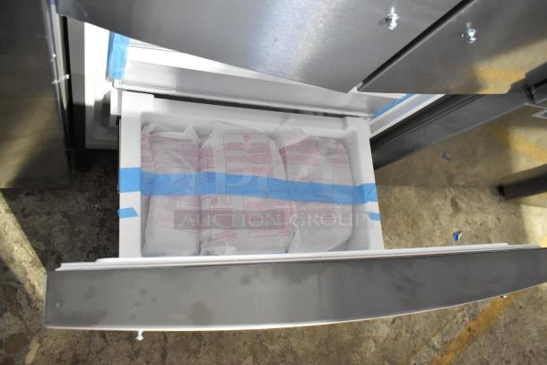 Brand new 2025 Frigidaire FRFG1723AV04 reach-in cooler with freezer, 115V, showing interior packaging and minor scratches.