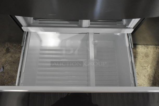 Brand new 2024 Frigidaire Gallery GRMS2773AF01 French Door Cooler, scratch and dent, open freezer drawer, sleek design.