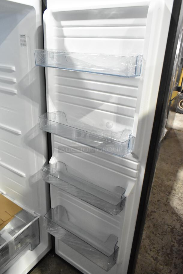 Brand new Vissani VSF11US2A16 convertible cooler/freezer, 115V, 1 phase, scratch and dent condition, interior shelving visible.