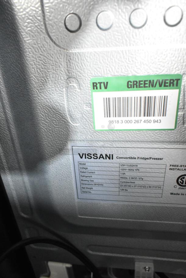 Brand new Vissani VSF11US2A16 convertible cooler/freezer, 115V, 1 Phase. Label shows model details and voltage. Scratch and dent condition.
