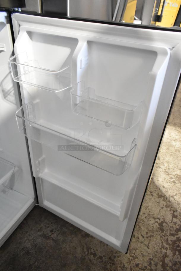 Brand new Vissani MDTF10BKES4 cooler with freezer, 115V, 1 Phase, featuring adjustable door shelves. Scratch and dent.