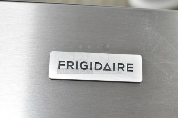 Frigidaire FRFN2813AF4 French door cooler, brand new, scratch and dent, 115 volts, 1 phase. Seen with logo tag.