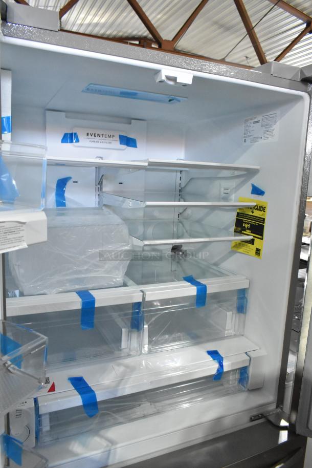 BRAND NEW Frigidaire FRFN2813AF4 French door refrigerator with freezer. Visible protective tape and factory tags. 115V, 1 Phase.