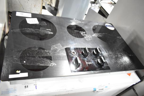 BRAND NEW Scratch and Dent Whirlpool WCE5US6HB00 Electric 5 Burner Range, 208/240V. Visible surface scratches.
