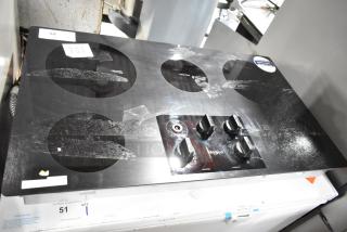 BRAND NEW Scratch and Dent Whirlpool WCE5US6HB00 Electric 5 Burner Range, 208/240V. Visible surface scratches.