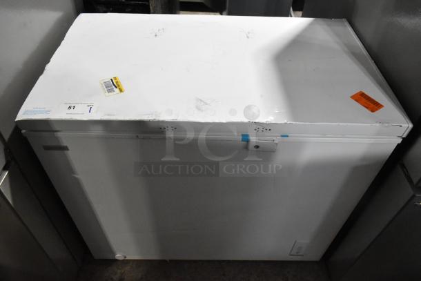 Brand new Vissani MDCF9WH chest freezer, 115 Volts, 1 Phase, with visible scratches and dents. Auction tags attached.