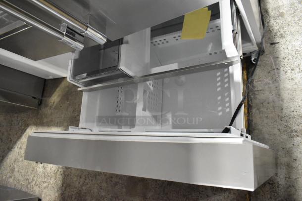 Brand new Frigidaire Professional PRFS2883AFF fridge. French door style, freezer drawer, ice/water dispenser, minor scuffs.