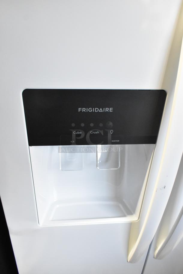 2025 Frigidaire Professional FRSS2323AW9 cooler, ice/water dispenser detail, new condition, minor scratches visible.