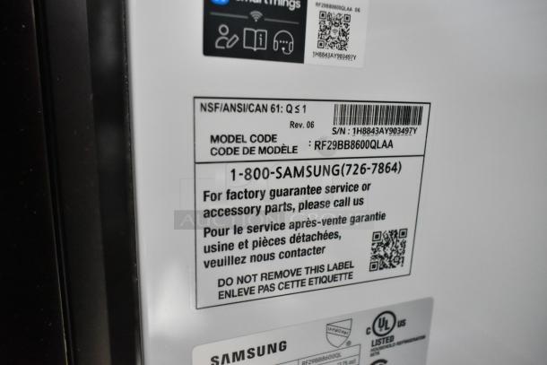 Samsung RF29BB8600QL cooler, French door style with freezer drawer. New scratch and dent. 115V, 1 phase. Labels shown for model and service info.