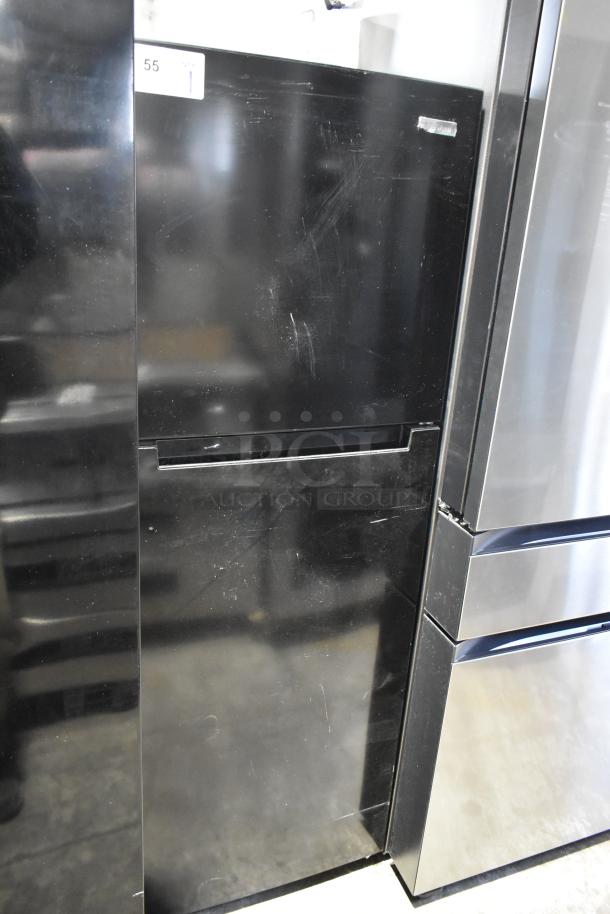 Brand new Vissani MDTF108KES4 cooler with freezer, 115V, 1 Phase. Scratch and dent condition visible on black exterior.