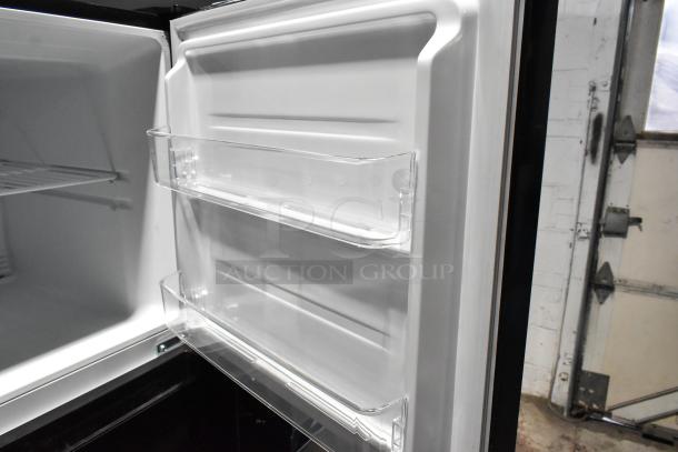 Brand new Vissani MDTF108KES4 cooler with freezer, 115V, 1 Phase. Scratch and dent condition; visible door racks and shelf.
