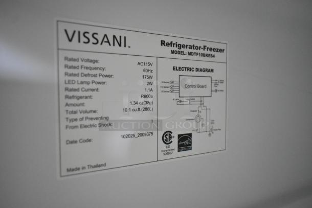 Alt text: "Vissani MDTF108KES4 cooler with freezer label showing specifications: 115V, 60Hz, 10.1 cu.ft., Energy Star certified."