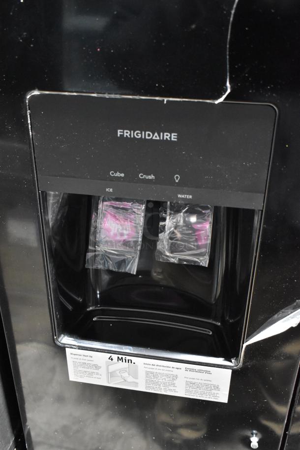 Frigidaire model FRSS2623ABC French door cooler, scratch dent, ice/water dispenser, black finish, new condition.
