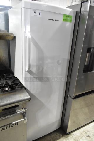 Hamilton Beach HBFRF0011 upright freezer, 11 cu ft, brand new with minor scratches, 115 volts, garage-ready label.