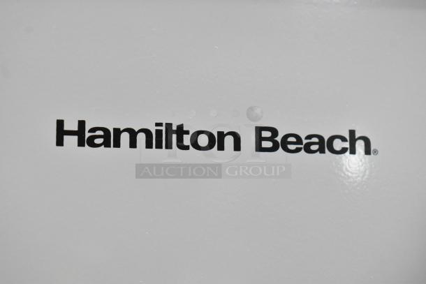 Hamilton Beach logo on brand new but scratch and dent 11 Cu Ft upright freezer, model HBFRF0011, 115V, 1 Phase.