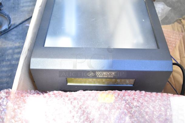 Lot of Documentor screen in a box, good condition. Model TPOS1225, visible label with Documentor brand and phone number.