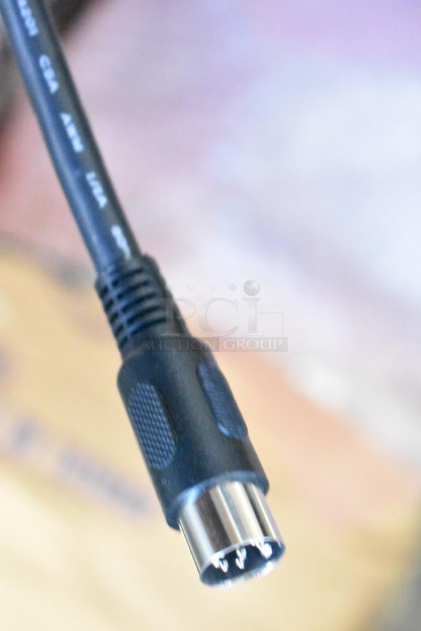 Lot of Documentor Screen and Tripod TPOS1225, cable close-up showing connector type.