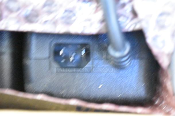 Lot of Documentor Screen and Tripod TPOS1225 connection port close-up. Image focus is unclear.