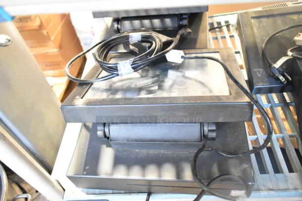 Lot of items including POS monitors, receipt printers, and wires. Mixed condition. Ideal for retail setup or parts.