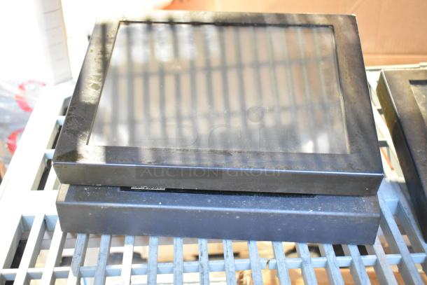 POS monitor with a black frame on a metal shelf, part of a 10-item auction including receipt printers and wires.