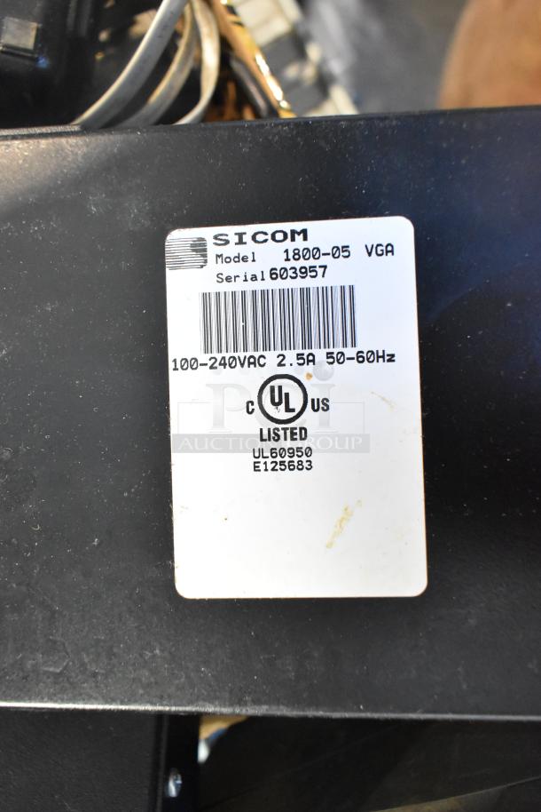 Label shows Sicom model 1800-05 VGA with serial 603957, 100-240VAC input, UL listed for compliance.